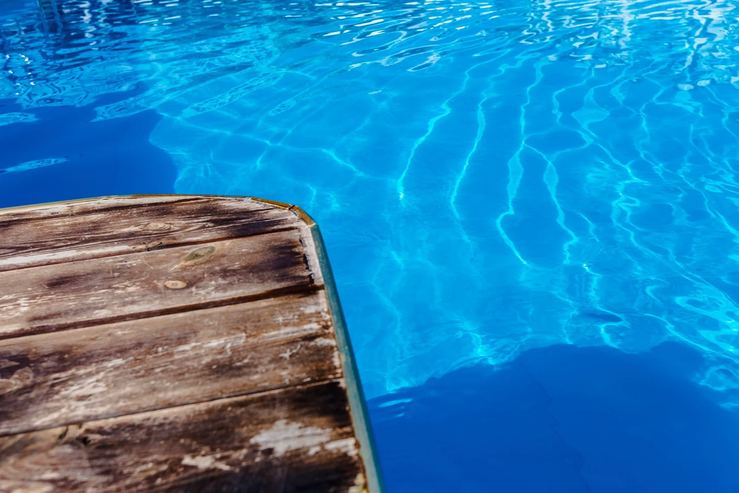 Sparkling pool water after Euro Pool Renovations repaint