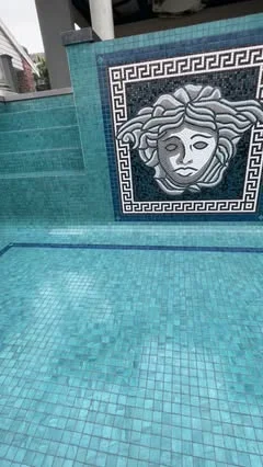Versace mosaic tiled pool by Euro Pool Renovations