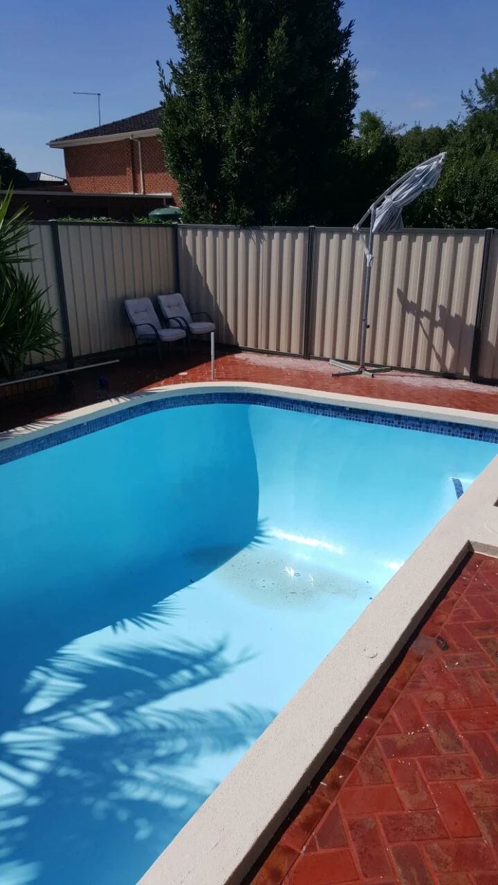 Completed pool renovation — painted and filled
