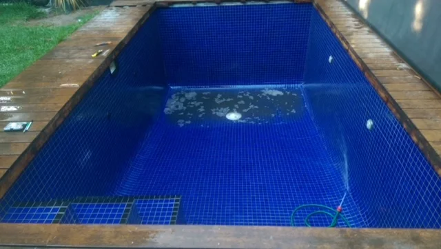 Freshly tiled pool, drained and ready to fill