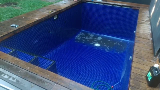 Interior of fully tiled swimming pool